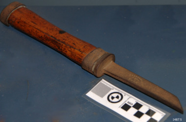Wooden handle with metal reinforcing on ends, metal shaft that tapers down from handle to blade's end
