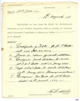 Receipt is on pale yellow paper and has printed and handwritten text