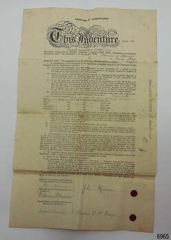 Printed certificate with handwritten details and wax seals