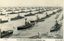 Black and white photograph of rows of battle ships
