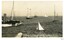 Group of vessels, in port, black and white photograph.