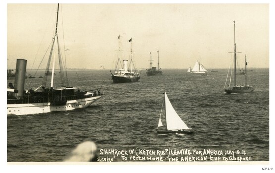 Group of vessels, in port, black and white photograph.