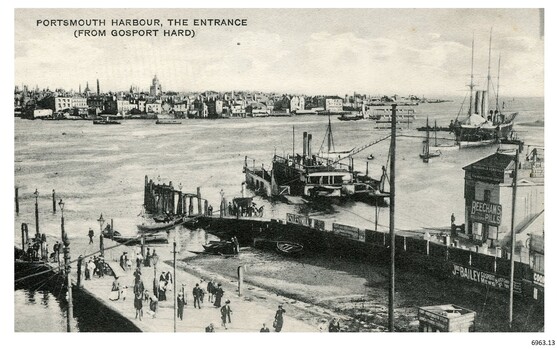 Ships in the harbour, people in the port.