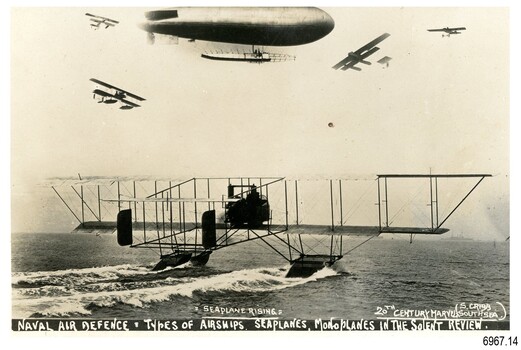 Black and white photograph of airships, sea planes and monoplanes