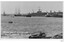 Black and white photograph includes a number of vessels