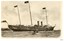 Battleship flying several flags. Black and white photograph