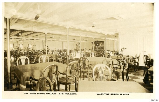 Sepia photograph of the dining room on board a shipo