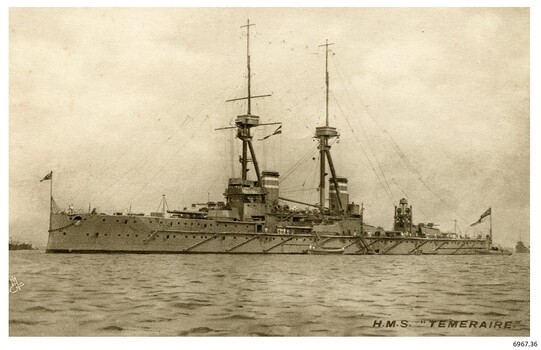 Black and white photograph of a ship at sea