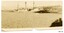 Sepia, small photograph of a ship in port, maybe the Nestor