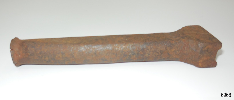 Tool's round shank has flattened surface on two sides, end is rectangular
