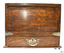Rectangular lacquered wooden box with ornate silver fixtures