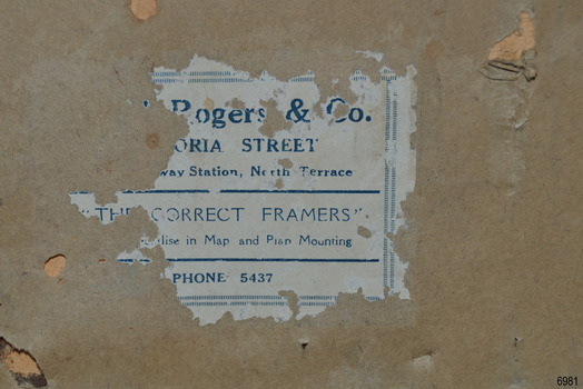 White label with blue print and lines. Part of maker's details