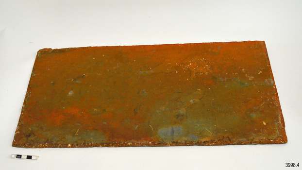 Tiel on table, strong orange-brown colouring