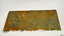 Tile has encrustations along the edge