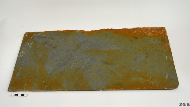 Tile has blue-green coloured slate