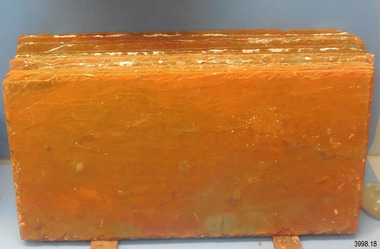Rectangular tiles bundled together, standing upright