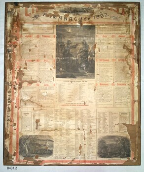 A large paper almanac stuck to the rear of the frame. Text is in red and black ink; it also has black and while biblical figures.