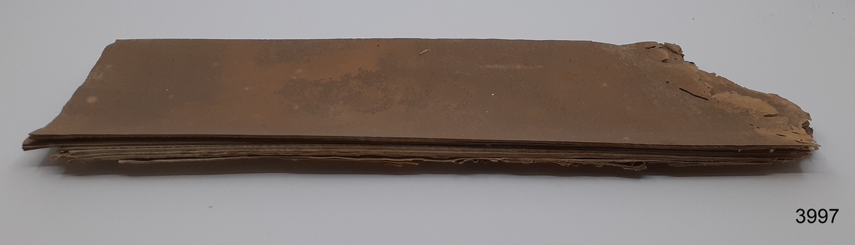 Several layers of sheets of paper stacked on top of each other