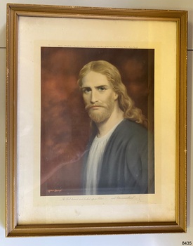 Framed print behind glass, portray of a male figure