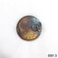 Badge has embossed text around and embossed wreath, and remnants of a metal catch