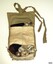 Khaki fabric pouch containing needles, thread, thimble and reel of cotton