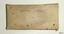 Rectangular cardboard box with handwritten inscription