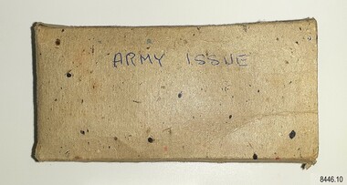 Rectangular cardboard box with handwritten inscription