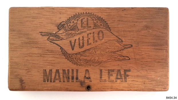 Wooden cigar box contains the stencil set