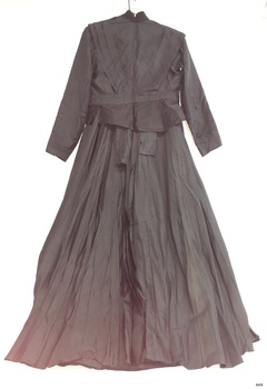 Outfit has a waist length jacket that joins at the front