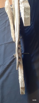 The mortar is fibrous and the slats are attached with nails.