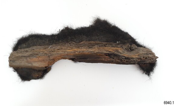 Wood' sample has layers of wood with holes showing, and furry texture on some edges