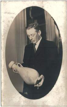 Image of Marshall Duncan holding the amphora, 1935