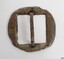 The silver plate has worn off.  The surface is pitted, discoloured and has been lacquered