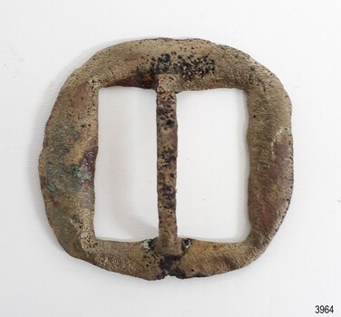 The silver plate has worn off.  The surface is pitted, discoloured and has been lacquered