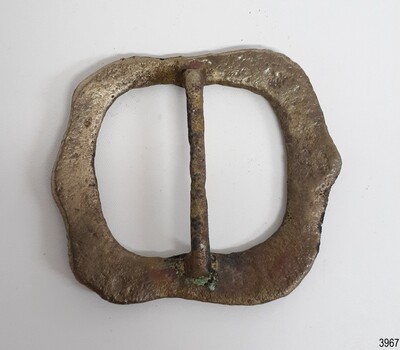 The silver plate has worn off.  The surface is pitted, discoloured and has been lacquered