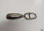 Two oval rings joined at 180 degrees on one short side. One ring has a bar between the long sides
