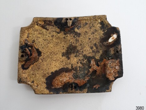 Underside has four clips that have corrosion.