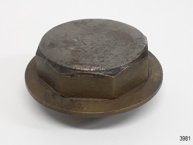 Brass octagonal nut with round head and rim
