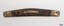 Knife has metal decoration on ends and centre
