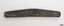 Drilled holes are spaced along the corroded knife
