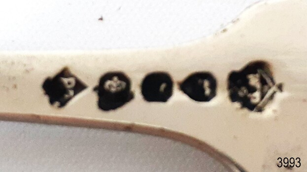 Close-up of Maker's Marks on fork