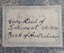 Label has printed blue border and text, pen and ink text and pencil text