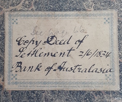 Label has printed blue border and text, pen and ink text and pencil text