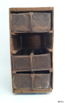Chest of drawers with wooden frame and rails, and three metal drawers with vertical handles