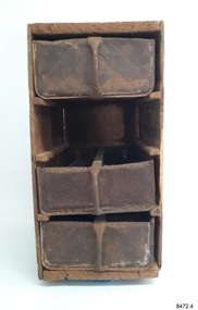 Chest of drawers with wooden frame and rails, and three metal drawers with vertical handles