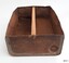 Tin drawer has wooden divider in centre. Pouring hole in tin has been closed.
