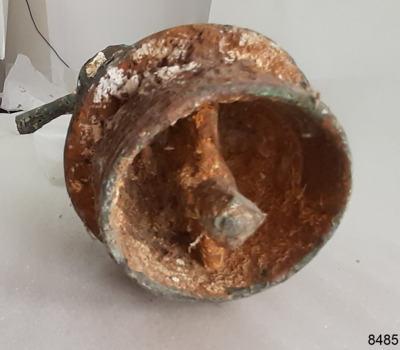 Outside of the base is threaded. Inside has a rode from side to side, with a bolted fitting in its centre