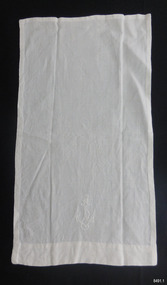 Rectangle of white linen with white embroidered emblem