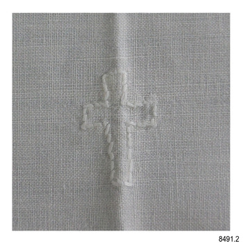 Symbol of a cross embroidered in white thread on white cloth