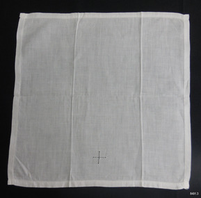 Square hemmed white cloth with drawn-thread emblem of a cross